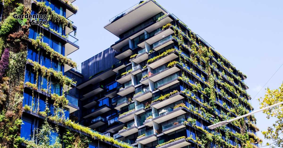 The image showcases a modern urban building extensively covered in vertical gardens, illustrating an innovative approach to gardening in city environments where space is limited. Vertical gardening makes use of upward space on building facades, balconies, and walls to grow plants, maximizing green areas in small footprints. This method not only beautifies the urban landscape but also contributes to improving air quality, reducing building temperatures, and enhancing biodiversity in the city. It represents a practical solution for urban dwellers eager to engage in gardening and sustainable living despite spatial constraints.