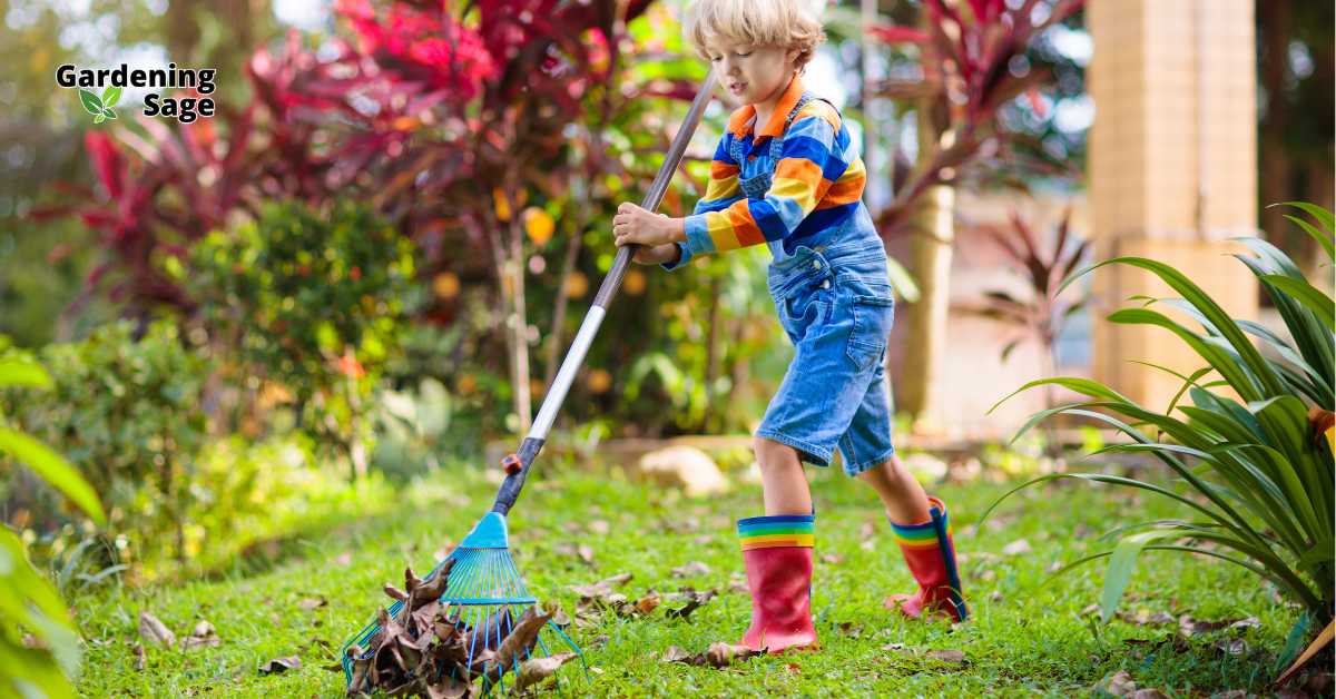 This image captures a delightful scene of a young boy engaging in gardening activities. Dressed in a colorful striped shirt and denim overalls, paired with vibrant red rubber boots, the child is actively using a blue rake to gather leaves in a lush garden. The background is rich with various plants, indicating a well-maintained and diverse garden. This picture beautifully illustrates the joy and learning that gardening can bring to children, fostering an early appreciation for nature and the environment. The setting suggests a playful yet educational approach to gardening, emphasizing the involvement of young ones in gardening tasks as a way to teach them about the outdoors and plant care.